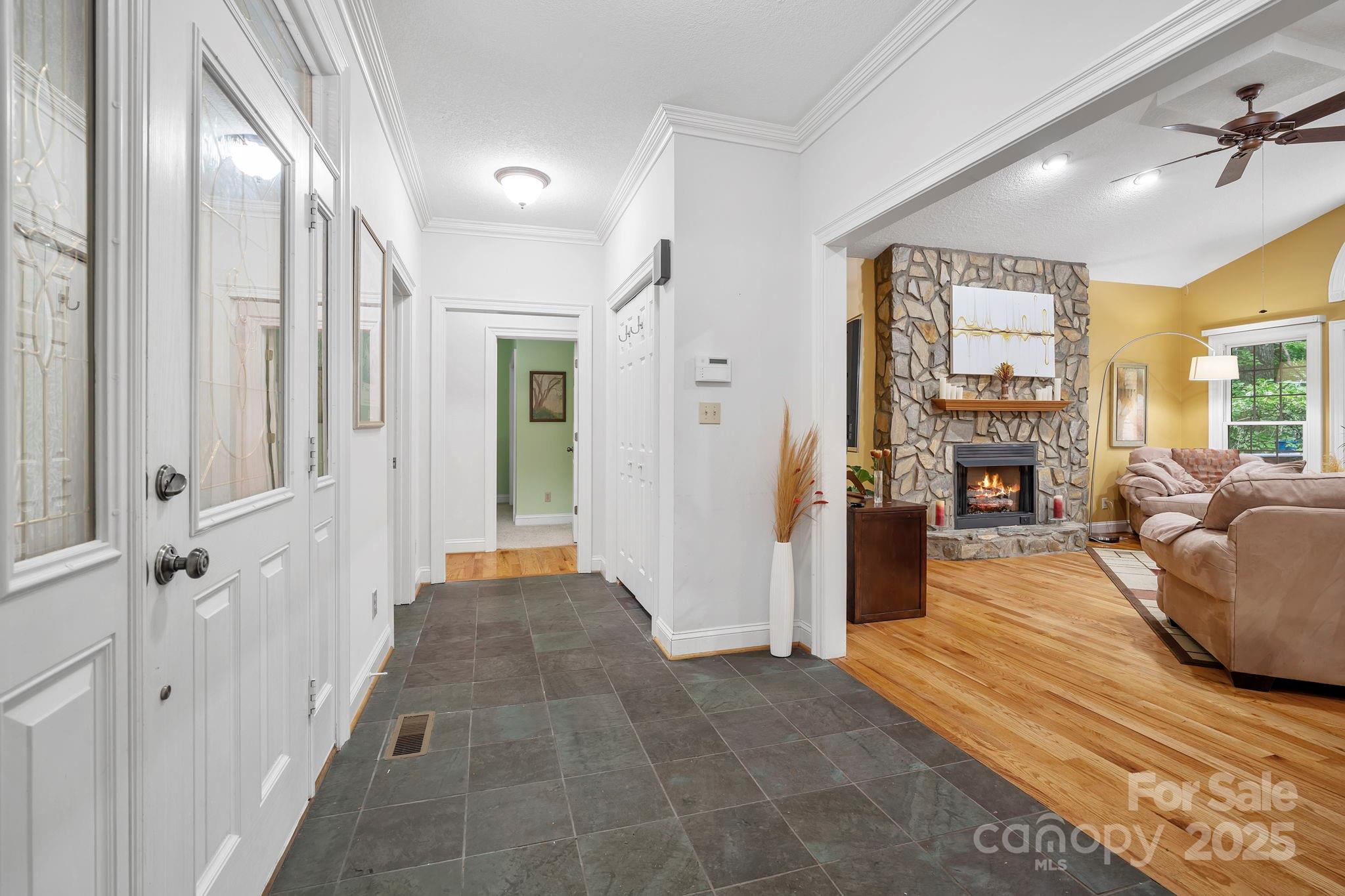 458 Blue Mist Way Arden, NC 28704 - Photo 6 of 47 a view of a livingroom with furniture a fireplace and windows