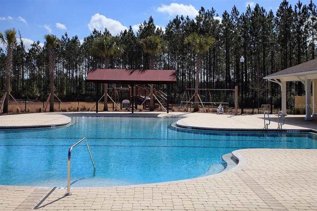 11 Long Point Way St. Augustine, FL 32092 - Photo 15 of 15 a view of a swimming pool with a patio