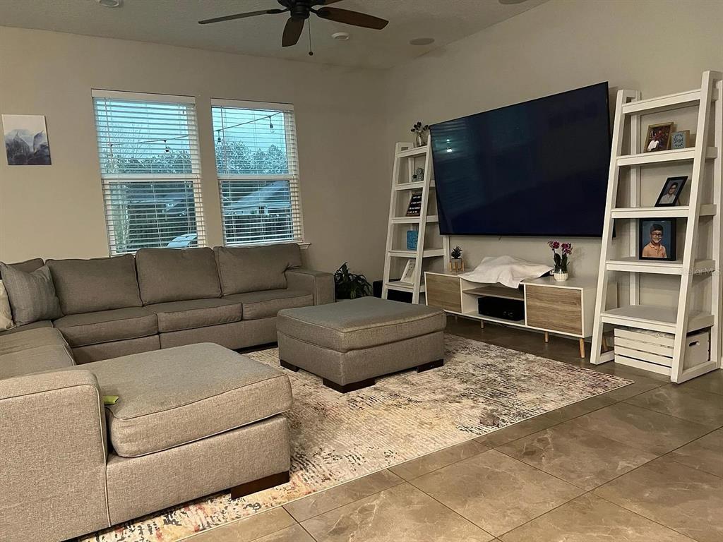 11 Long Point Way St. Augustine, FL 32092 - Photo 7 of 15 a living room with furniture and a flat screen tv