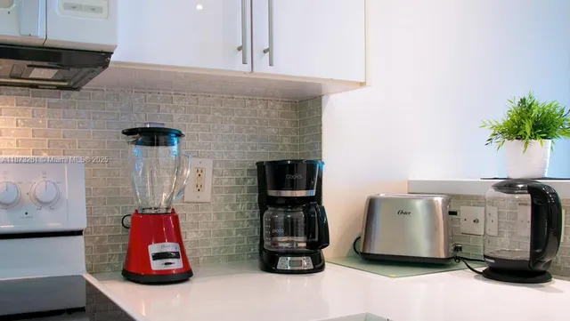 a room with furniture and a flat screen tv
