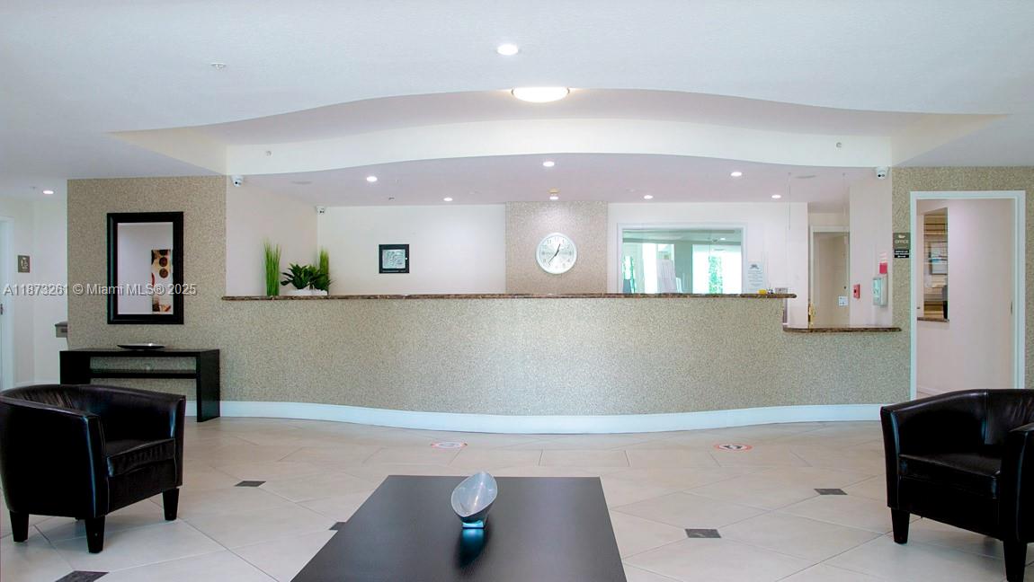 18100 North Bay Road, Unit 509 Sunny Isles Beach, FL 33160 - Photo 9 of 14 a view of kitchen with wooden floor