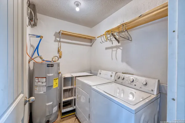 a kitchen with sink and window