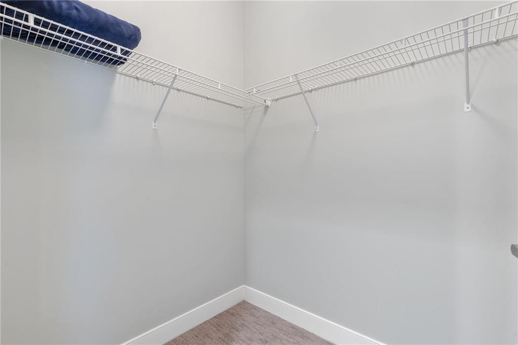 201 West Ponce De Leon Avenue, Unit 35 Decatur, GA 30030 - Photo 12 of 42 a view of a room with racks on the wall