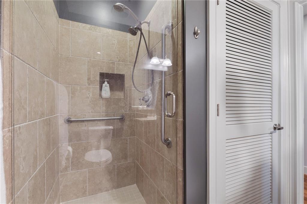 201 West Ponce De Leon Avenue, Unit 35 Decatur, GA 30030 - Photo 17 of 42 a bathroom with a shower
