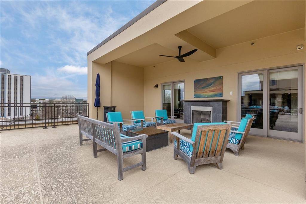 201 West Ponce De Leon Avenue, Unit 35 Decatur, GA 30030 - Photo 22 of 42 a outdoor space with patio furniture and a fireplace