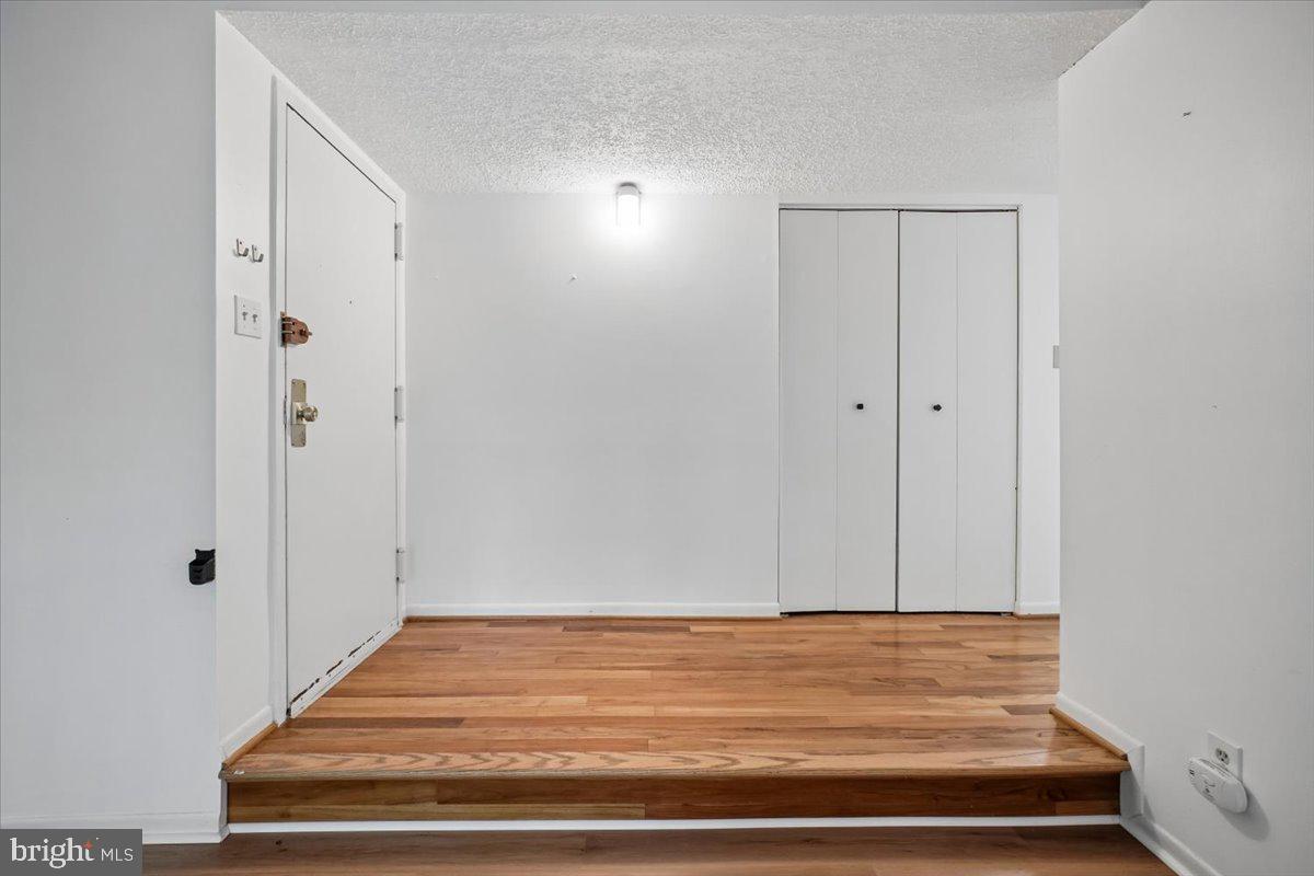 11805 Breton Court, Unit 1A Reston, VA 20191 - Photo 3 of 22 Foyer