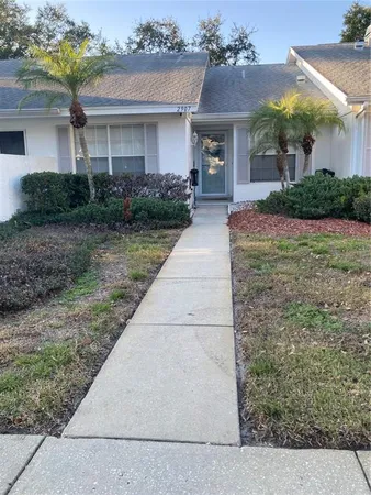 front view of house with a yard