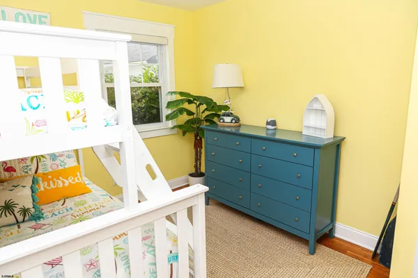 a bedroom with a bed and a bed