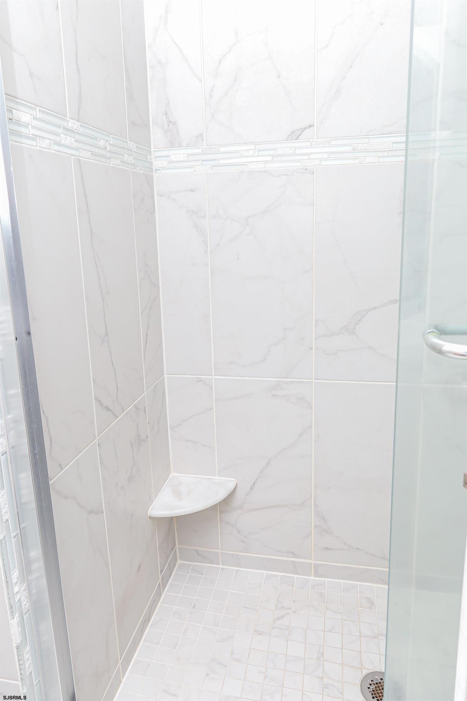 8 44th Cove Brigantine, NJ 08203 - Photo 34 of 57 a bathroom with a shower
