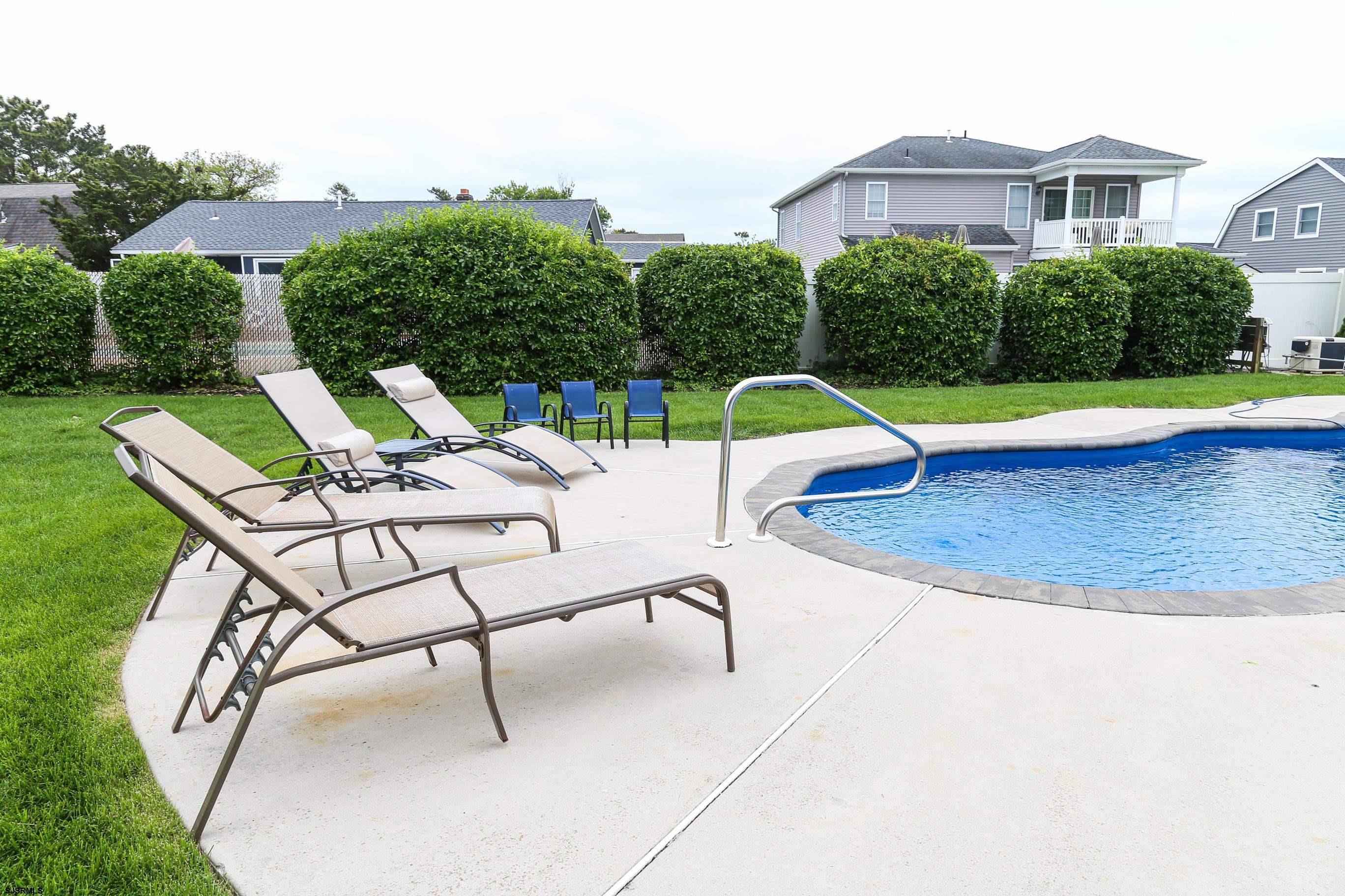 8 44th Cove Brigantine, NJ 08203 - Photo 38 of 57 a view of a backyard with a patio