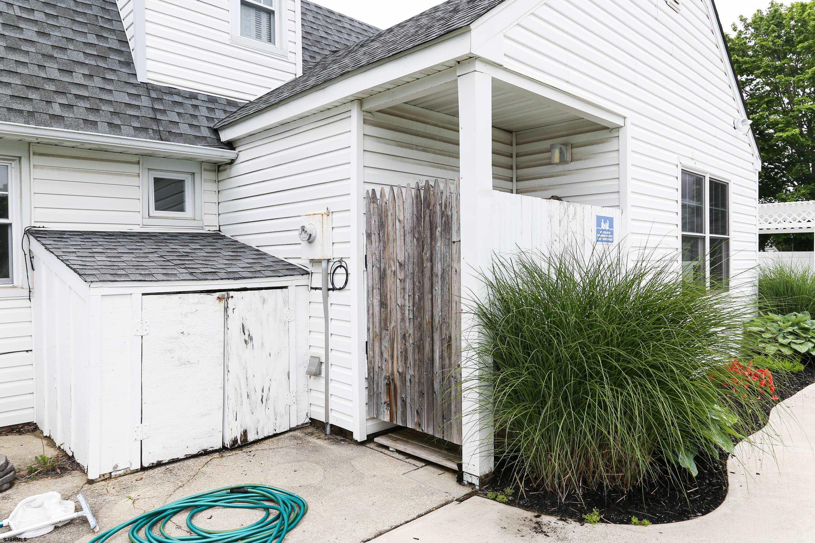 8 44th Cove Brigantine, NJ 08203 - Photo 43 of 57 a view of a house with a sink and plants