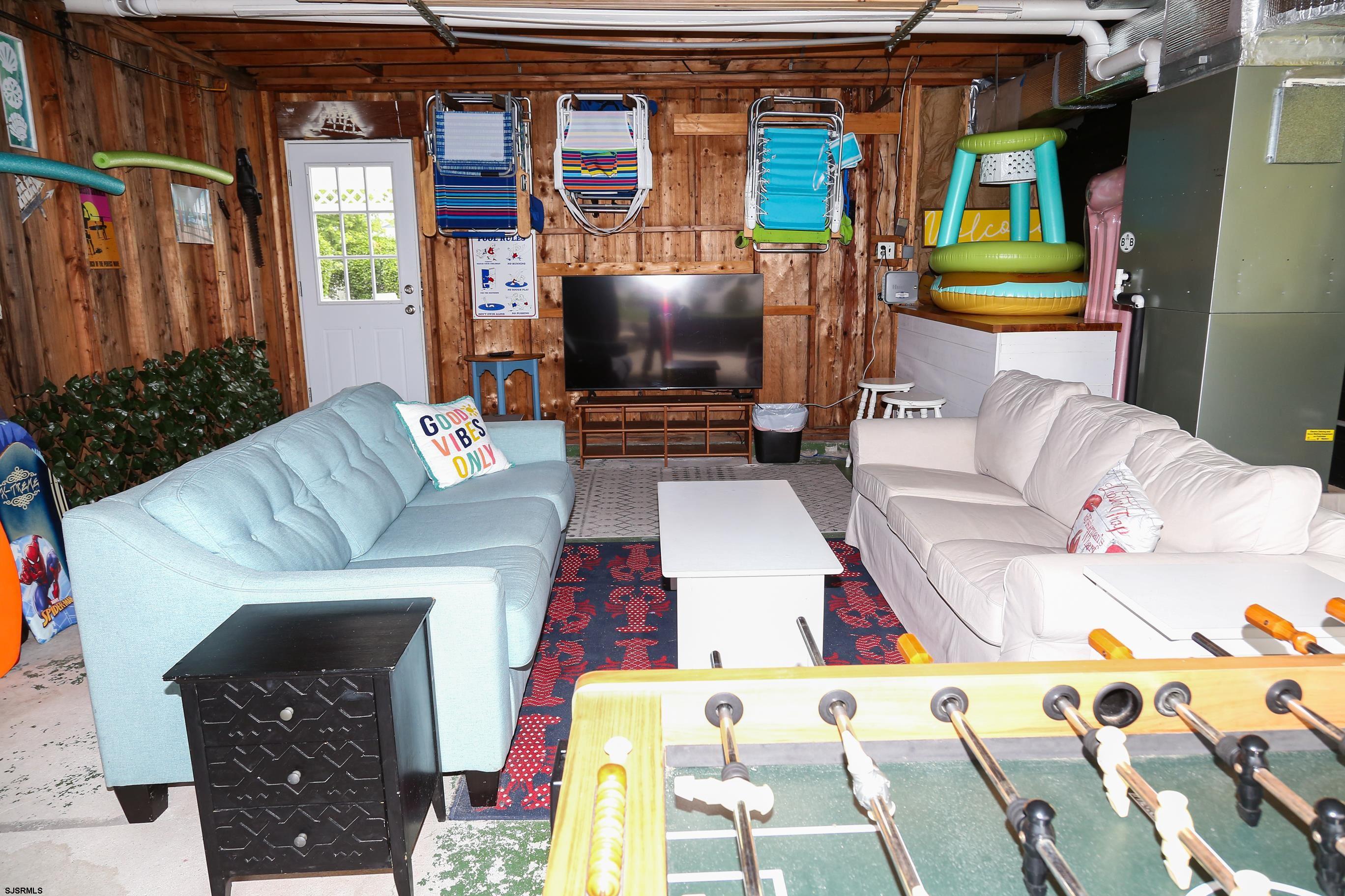 8 44th Cove Brigantine, NJ 08203 - Photo 47 of 57 a living room with furniture and a couch
