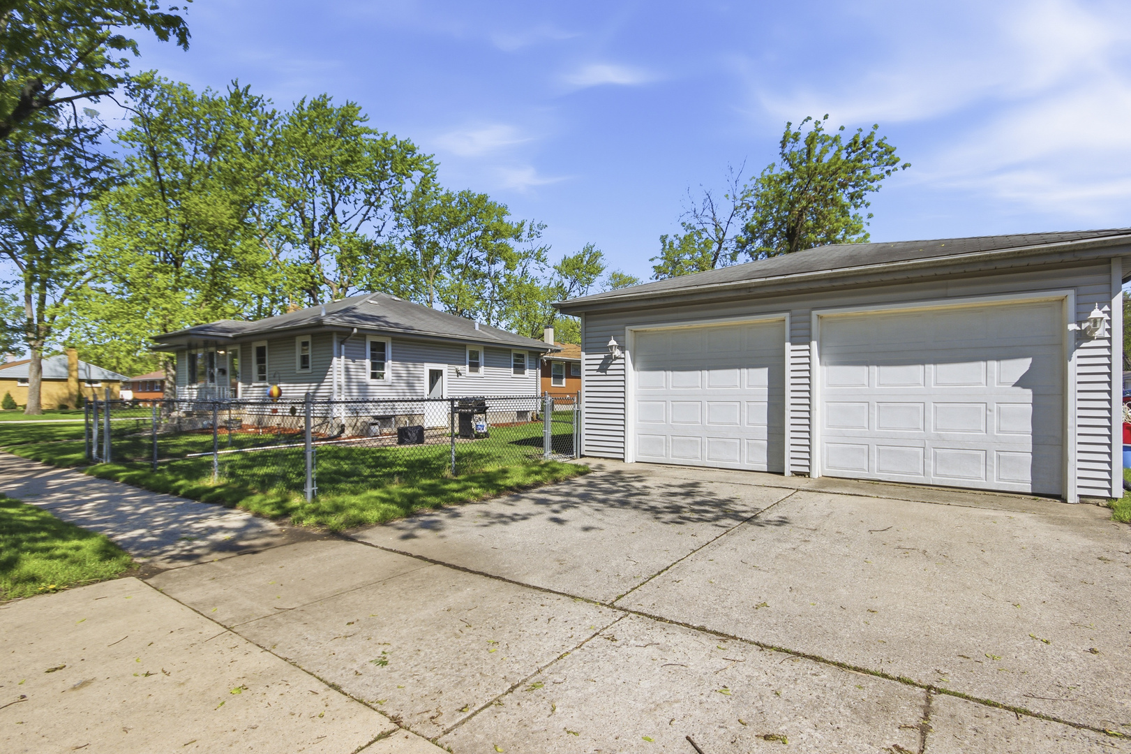 18655 Sherman Street Lansing, IL 60438 - Photo 21 of 21 front view of a house with a garden