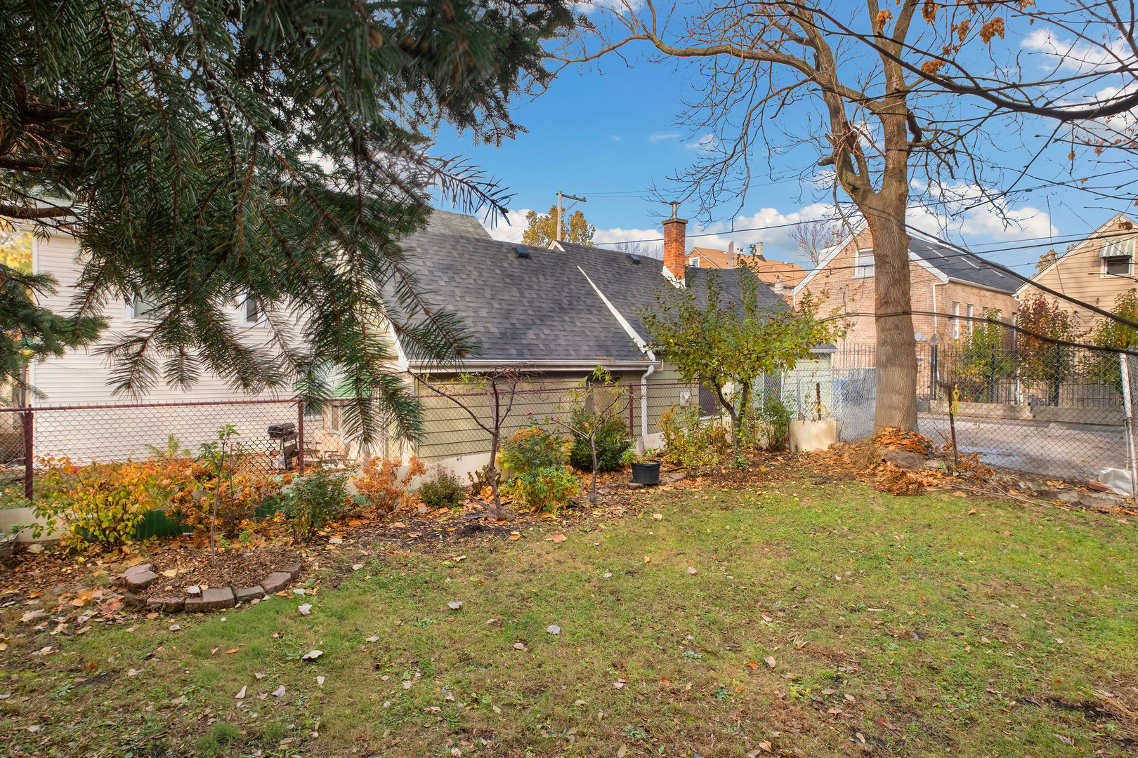 2606 West 24th Place Chicago, IL 60608 - Photo 2 of 6 a view of a house with a yard