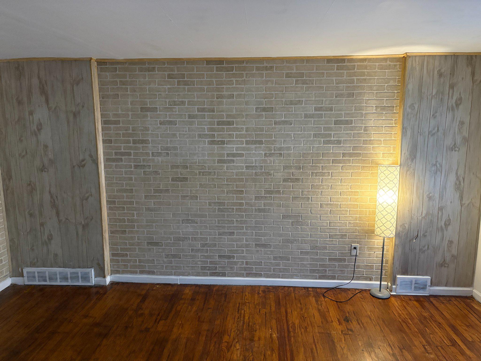 3419 Carter Lane Chester, PA 19013 - Photo 6 of 52 Unit 1 - Warm tones and textured walls unite.