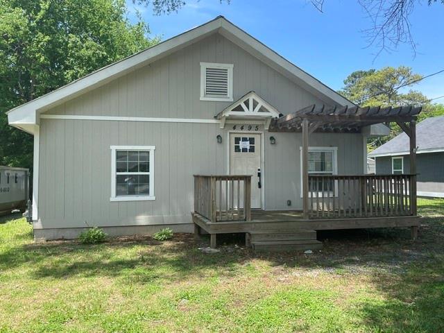 4495 Calhoun Road Northeast Rome, GA 30161 - Photo 2 of 14 a front view of a house with a yard