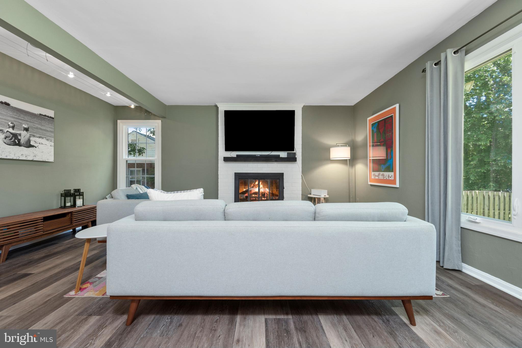 2612 Mountain Laurel Place Reston, VA 20191 - Photo 4 of 27 Family room with wood burning fireplace