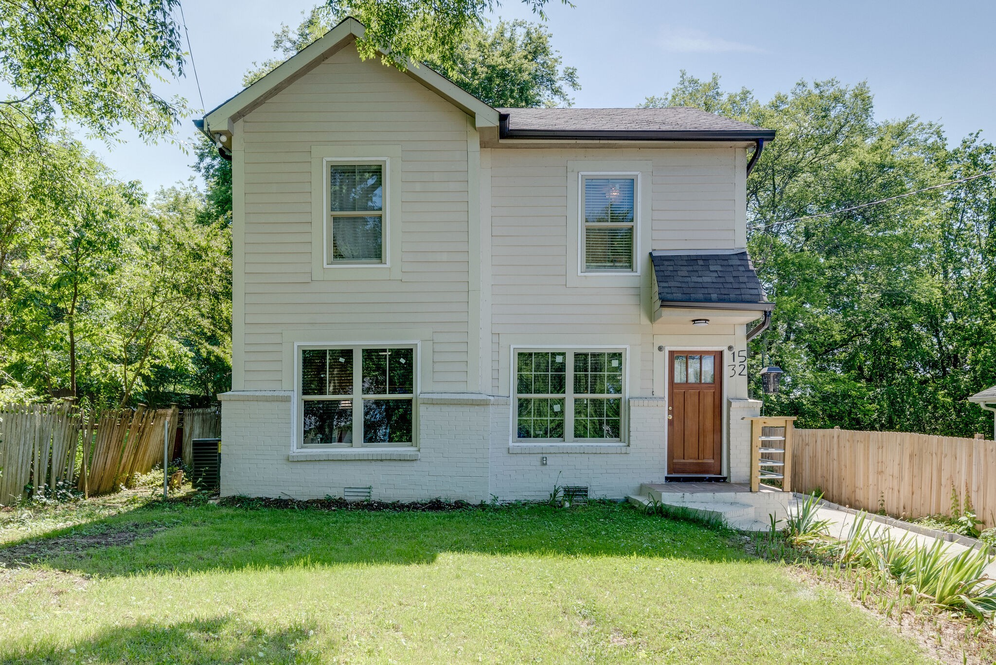 1532 Mohawk Trail Madison, TN 37115 - Photo 1 of 22 a view of a house with a yard and plants