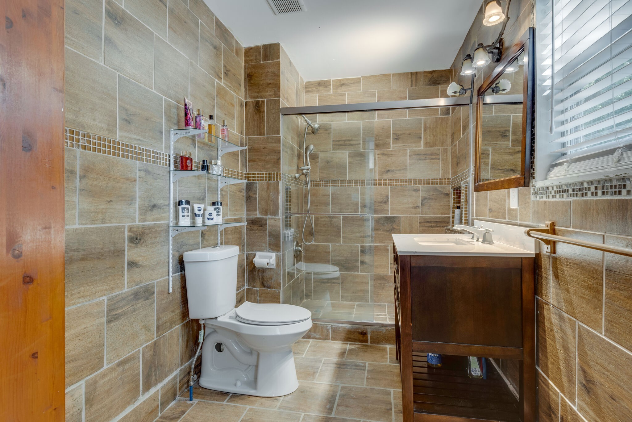 1532 Mohawk Trail Madison, TN 37115 - Photo 11 of 22 a bathroom with a toilet and a shower