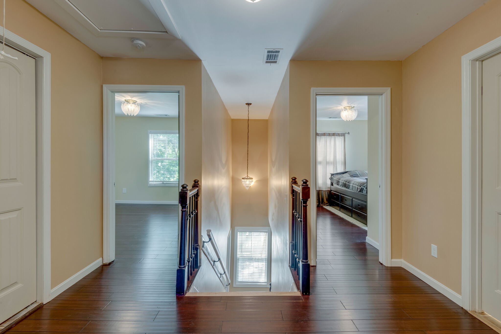 1532 Mohawk Trail Madison, TN 37115 - Photo 13 of 22 a view of a hallway with wooden floor windows and a livingroom