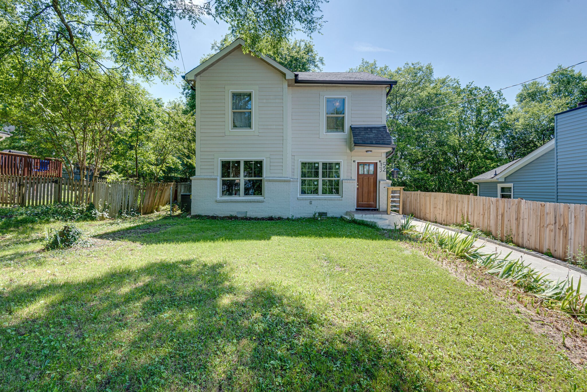1532 Mohawk Trail Madison, TN 37115 - Photo 2 of 22 a view of a house with backyard and wooden fence