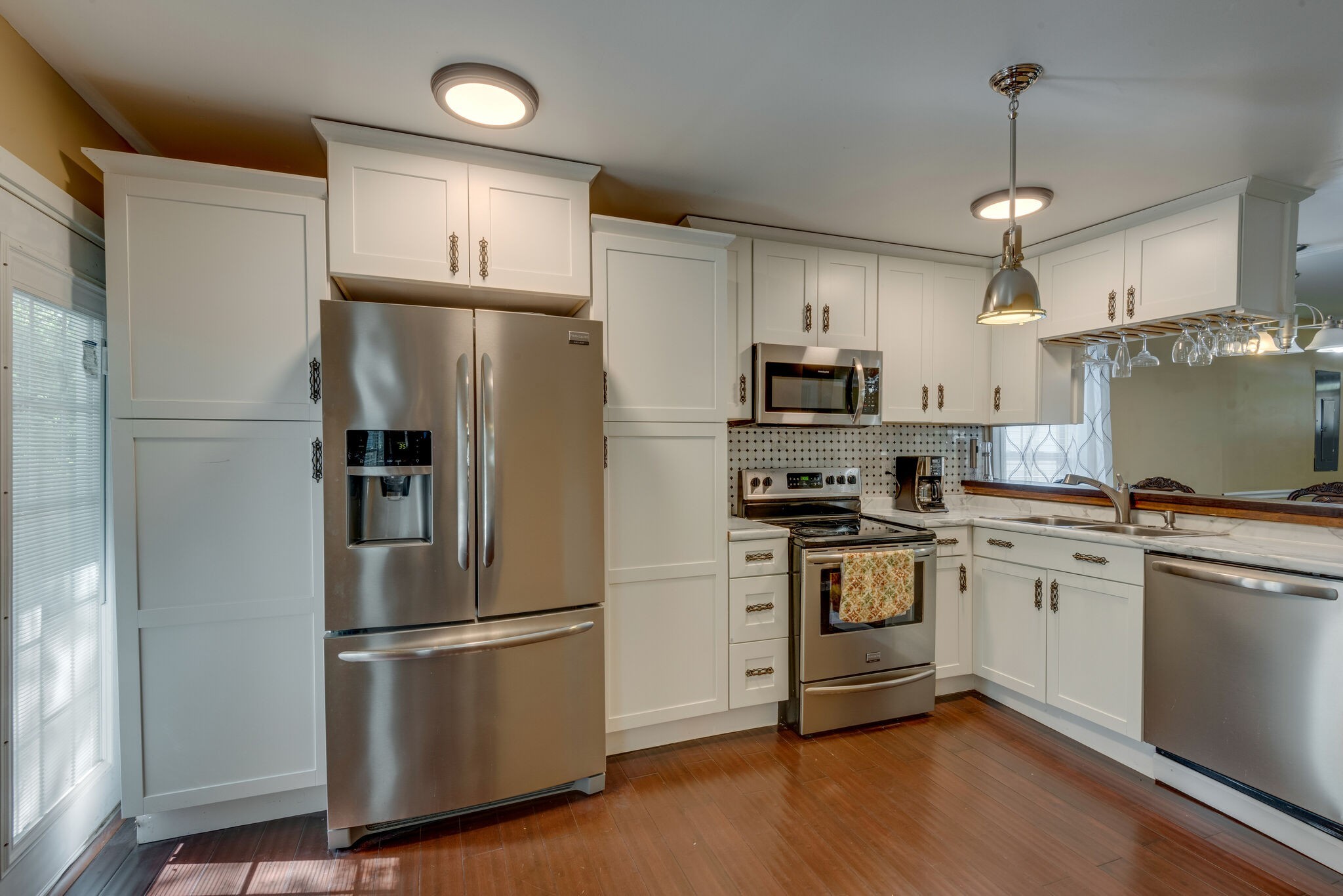 1532 Mohawk Trail Madison, TN 37115 - Photo 10 of 22 a kitchen with stainless steel appliances a refrigerator sink and microwave