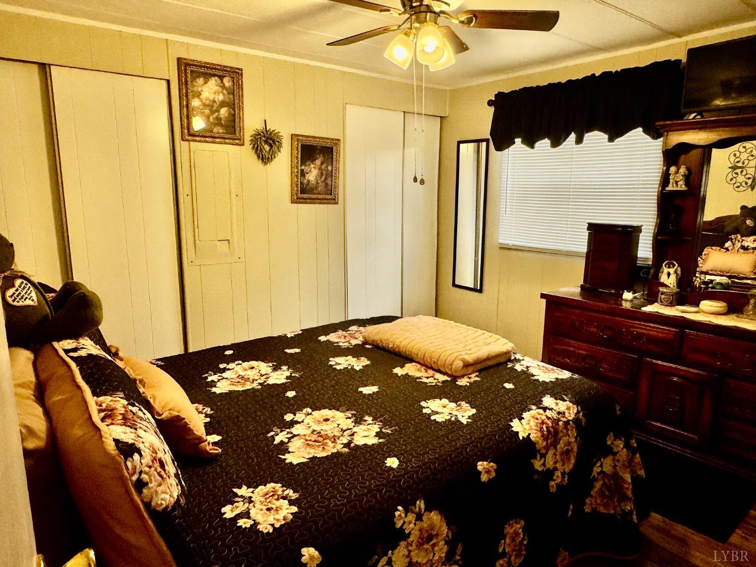 6223 Joppa Mill Road Moneta, VA 24121 - Photo 39 of 55 a bedroom with a bed and a window