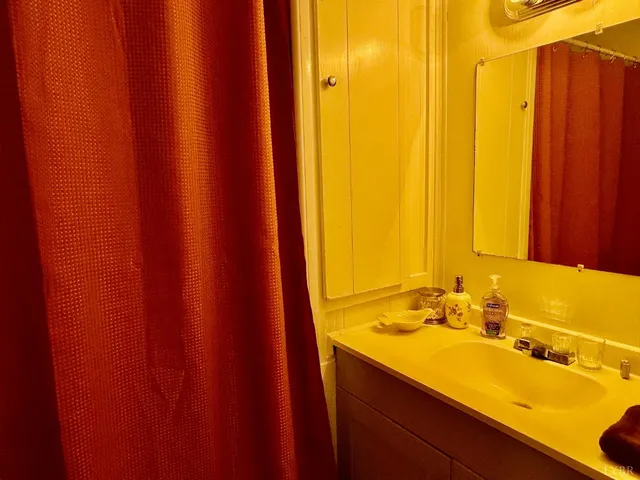 a view of swimming pool with seating area