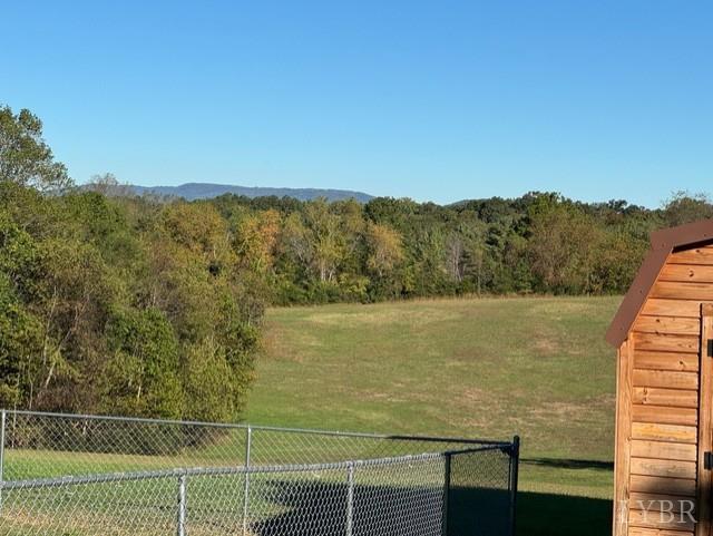 6223 Joppa Mill Road Moneta, VA 24121 - Photo 49 of 55 a view of a lake with a mountain in the background