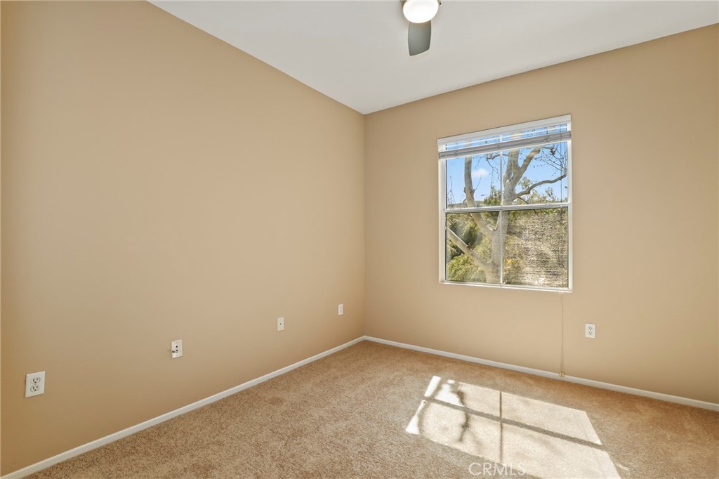 20000 Plum Canyon Road, Unit 1722 Saugus, CA 91350 - Photo 16 of 30 an empty room with windows