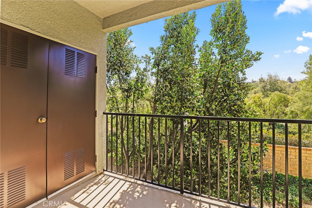 20000 Plum Canyon Road, Unit 1722 Saugus, CA 91350 - Photo 19 of 30 a view of balcony with wooden floor