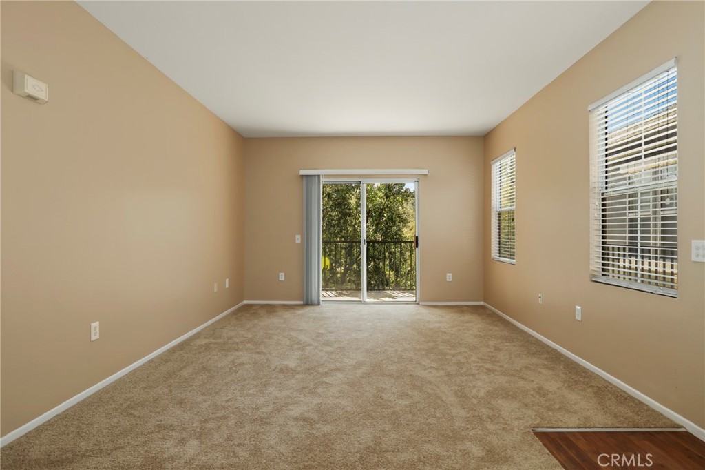 20000 Plum Canyon Road, Unit 1722 Saugus, CA 91350 - Photo 3 of 30 a view of an empty room with a window