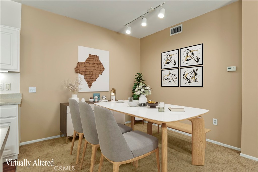 20000 Plum Canyon Road, Unit 1722 Saugus, CA 91350 - Photo 9 of 30 a view of a dining room with furniture
