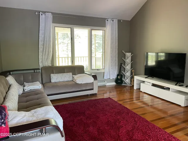 a kitchen with a sink a stove and cabinets