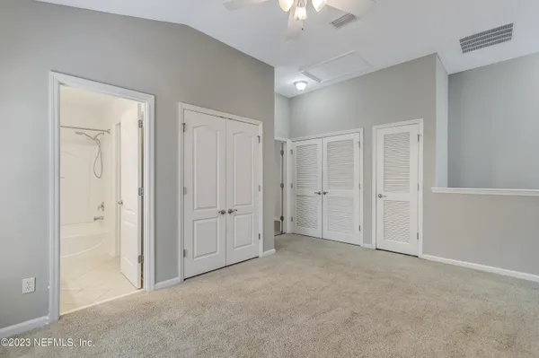 an empty room with a bathroom