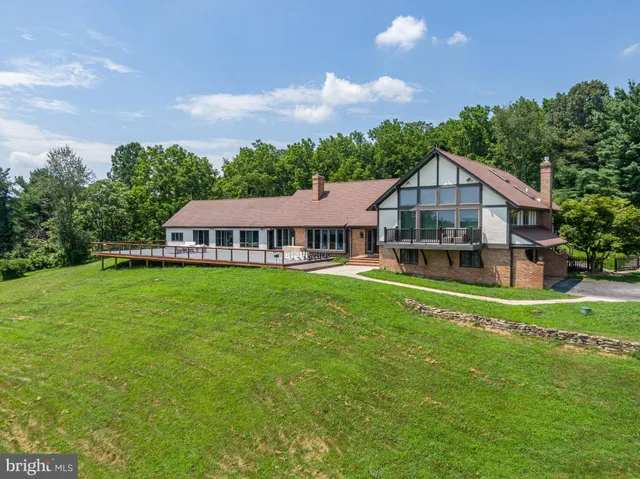 a view of a house with a big yard