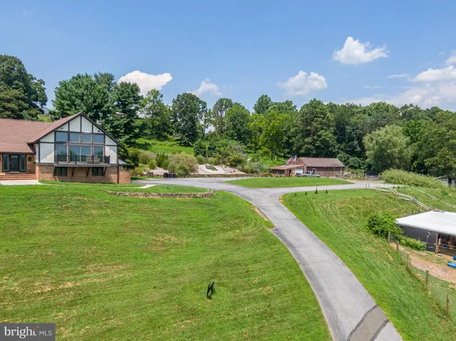 a view of a house with a big yard