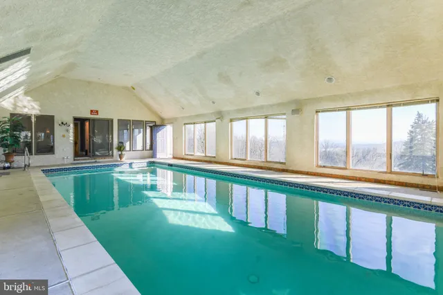 an aerial view of a pool
