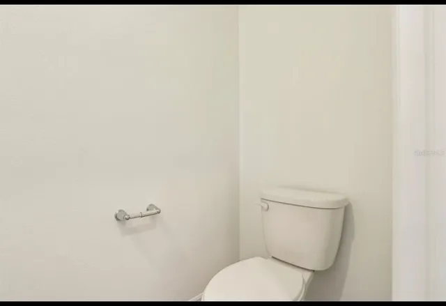 an empty room with an entryway