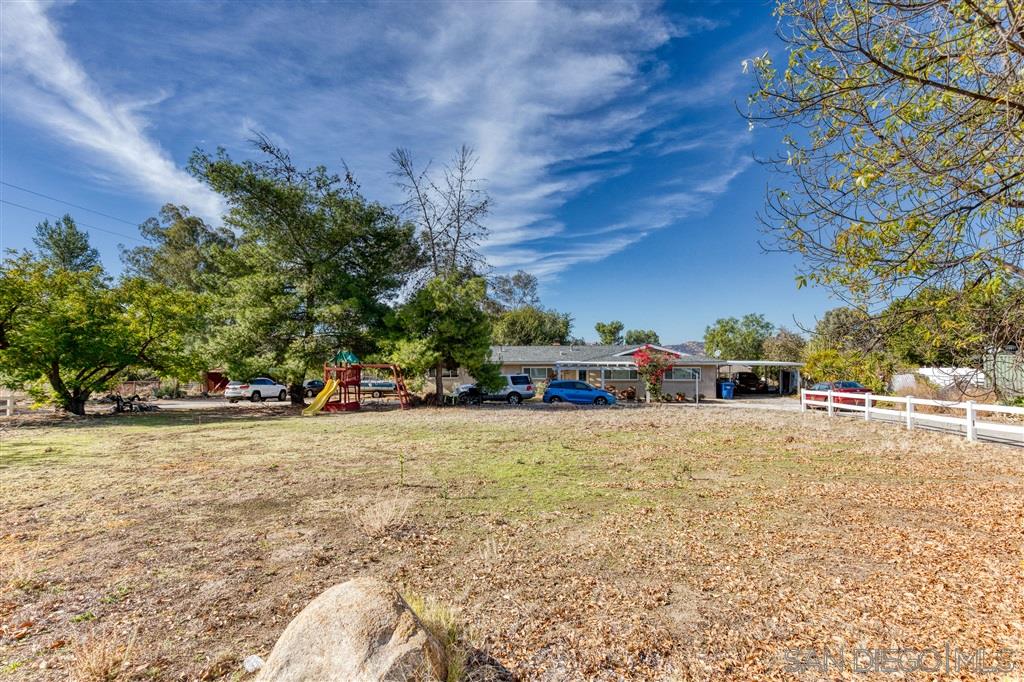 a swimming pool with a yard