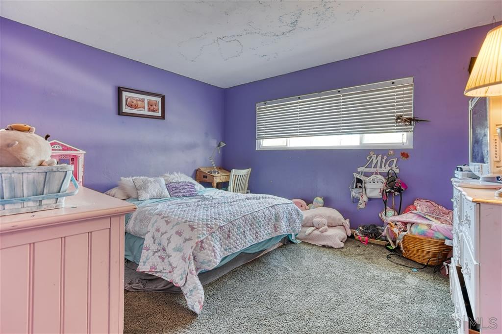 1906 Tavern Road Alpine, CA 91901 - Photo 11 of 16 a bedroom with a bed and a window