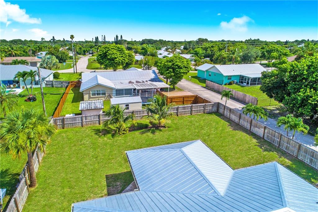 5111 Southeast Post Terrace Stuart, FL 34997 - Photo 23 of 34 a view of a house with a yard