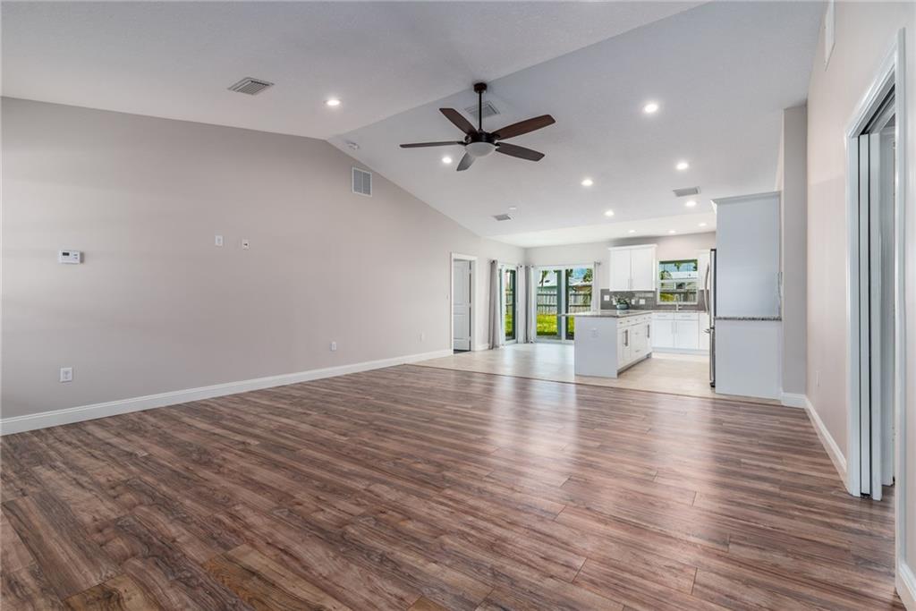 5111 Southeast Post Terrace Stuart, FL 34997 - Photo 8 of 34 a view of empty room with wooden floor