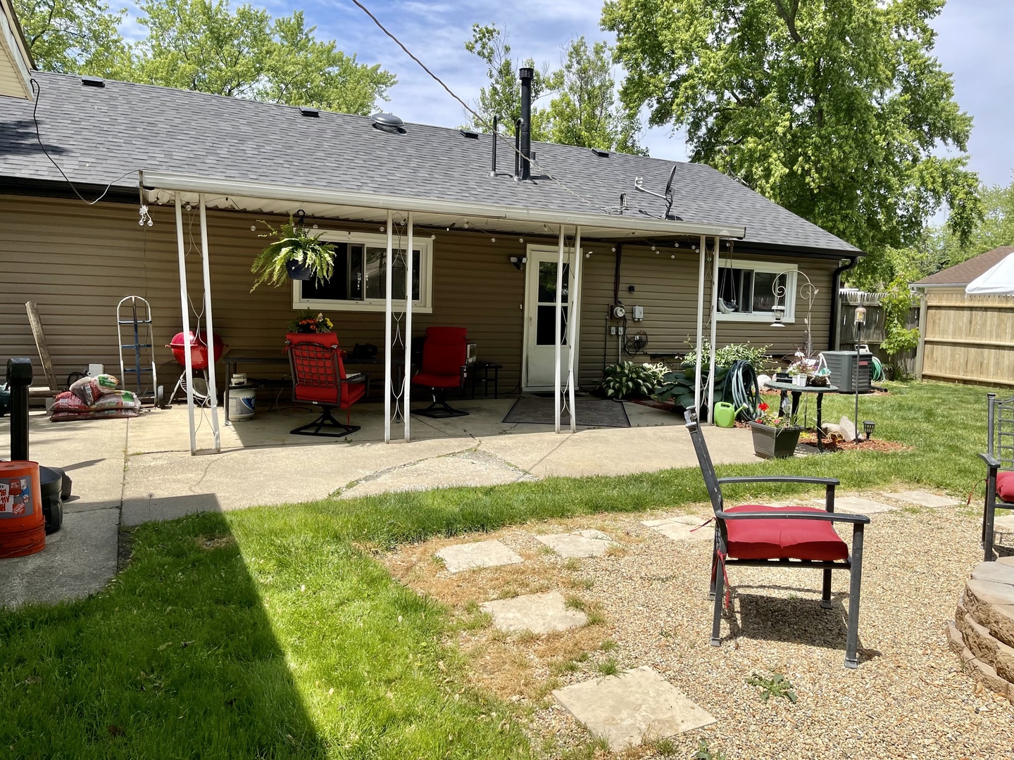 63 Stratford Road Montgomery, IL 60538 - Photo 16 of 24 a view of a house with a patio