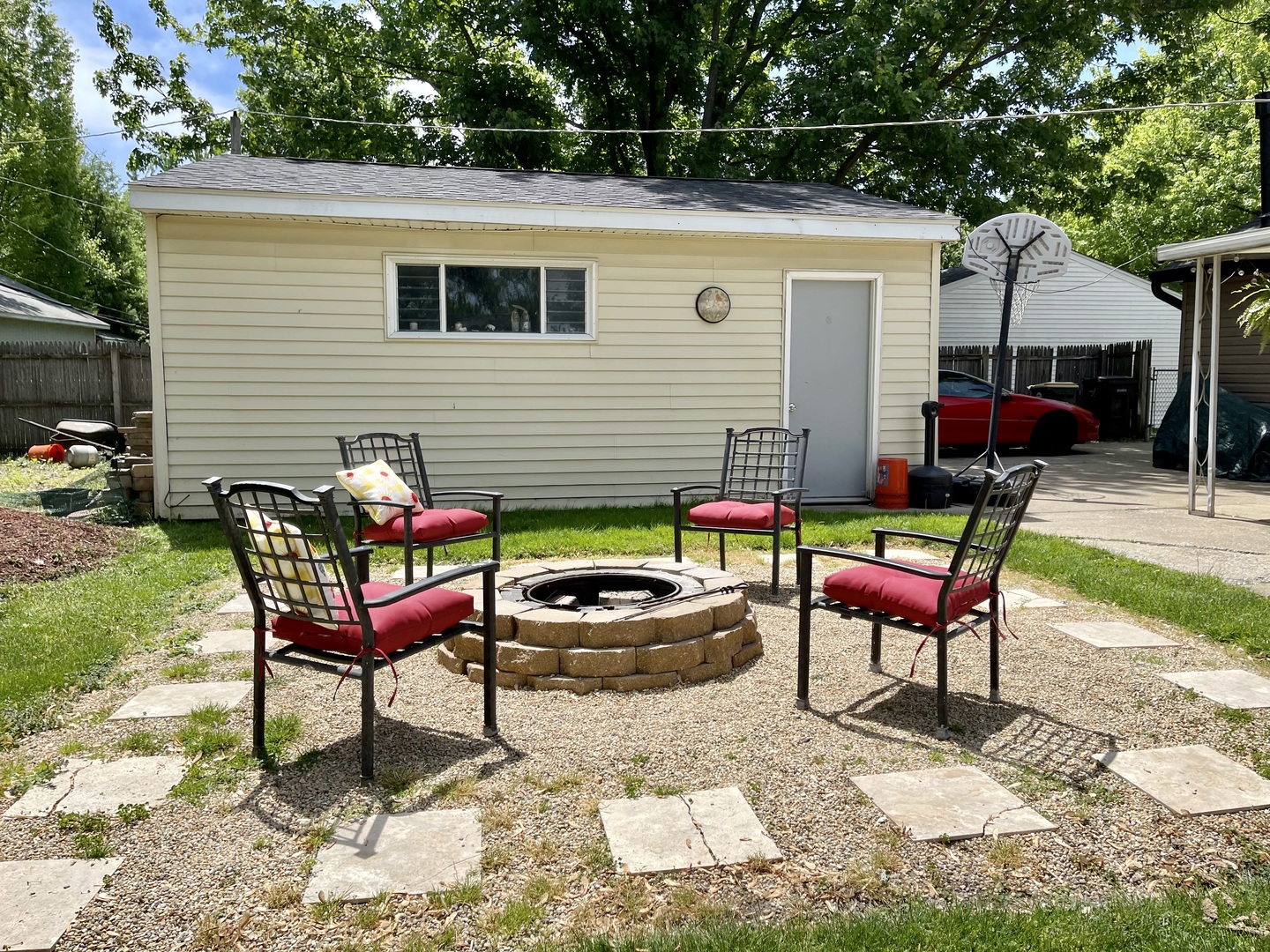 63 Stratford Road Montgomery, IL 60538 - Photo 21 of 24 a backyard of a house with seating space