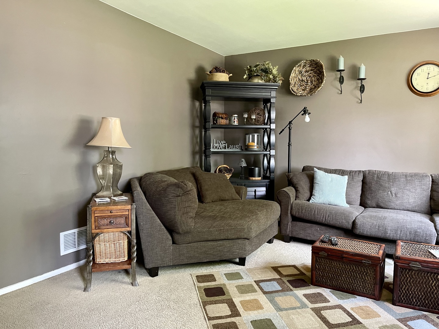 63 Stratford Road Montgomery, IL 60538 - Photo 4 of 24 a living room with furniture and a chair