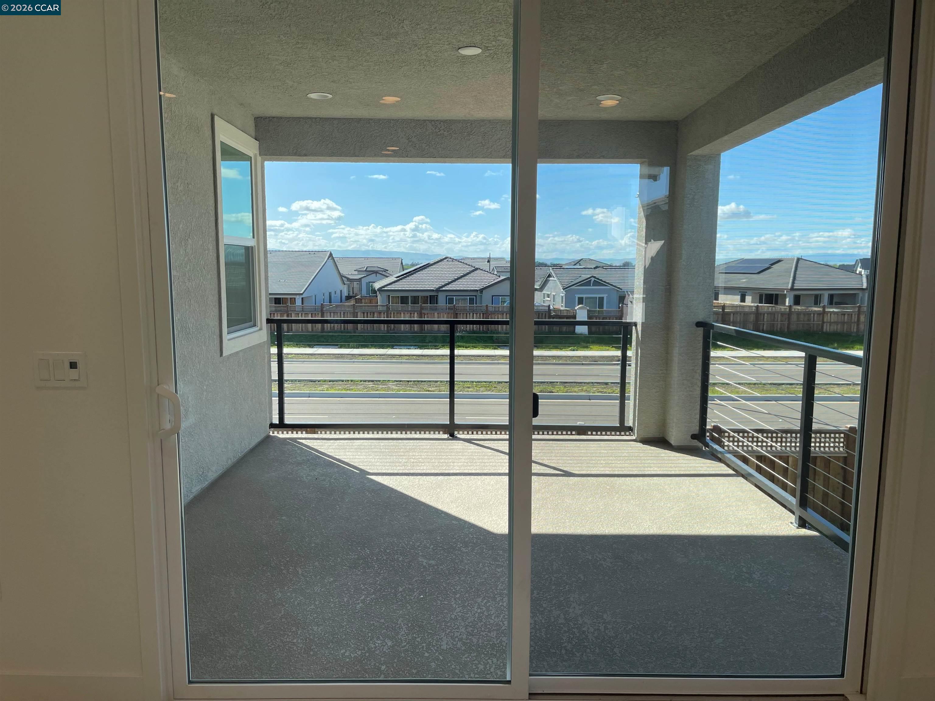 17549 Bushwick Lane Lathrop, CA 95330 - Photo 7 of 10 a view of a floor to ceiling window and an entryway