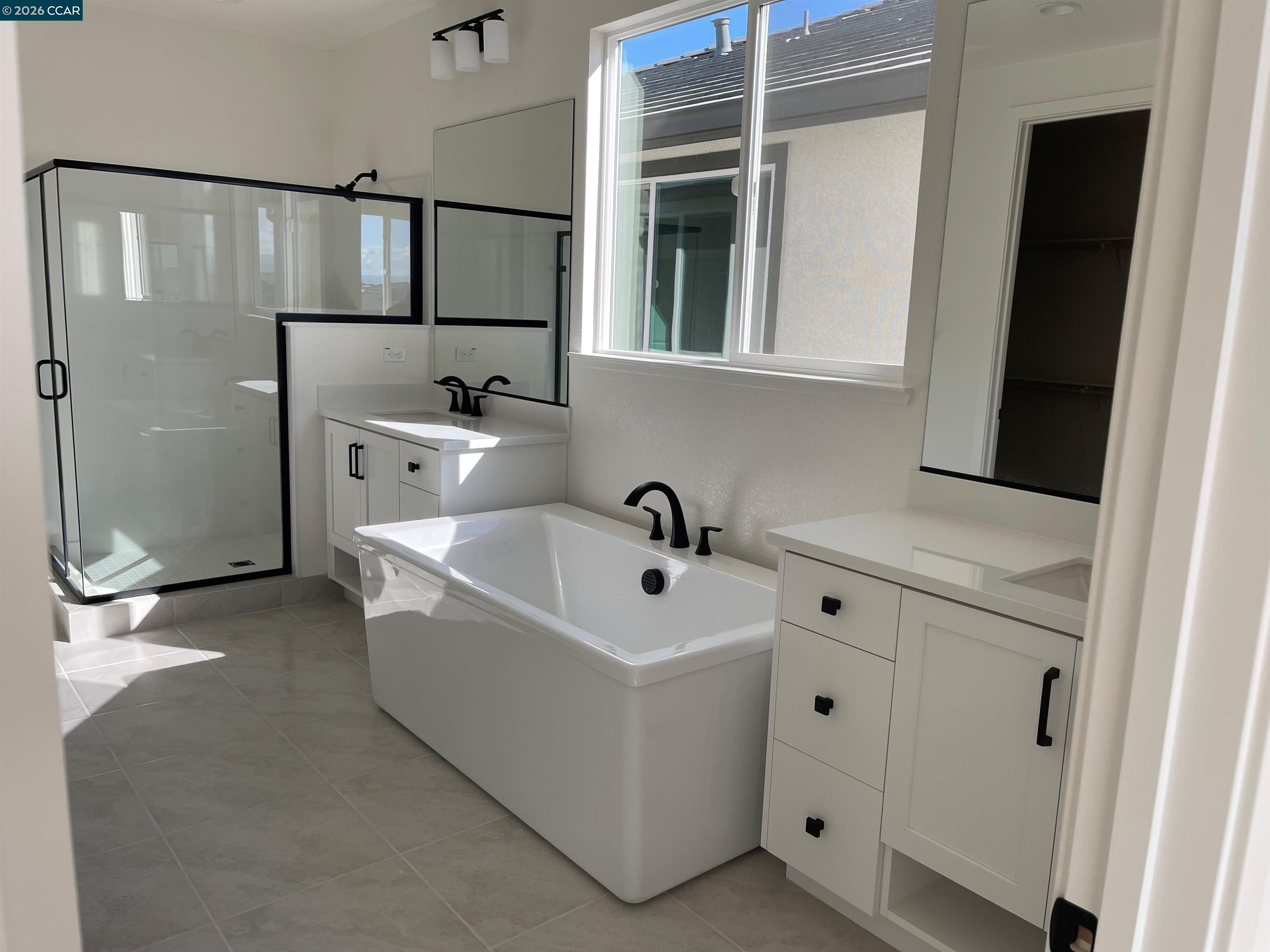 17549 Bushwick Lane Lathrop, CA 95330 - Photo 8 of 10 a bathroom with a sink and mirror
