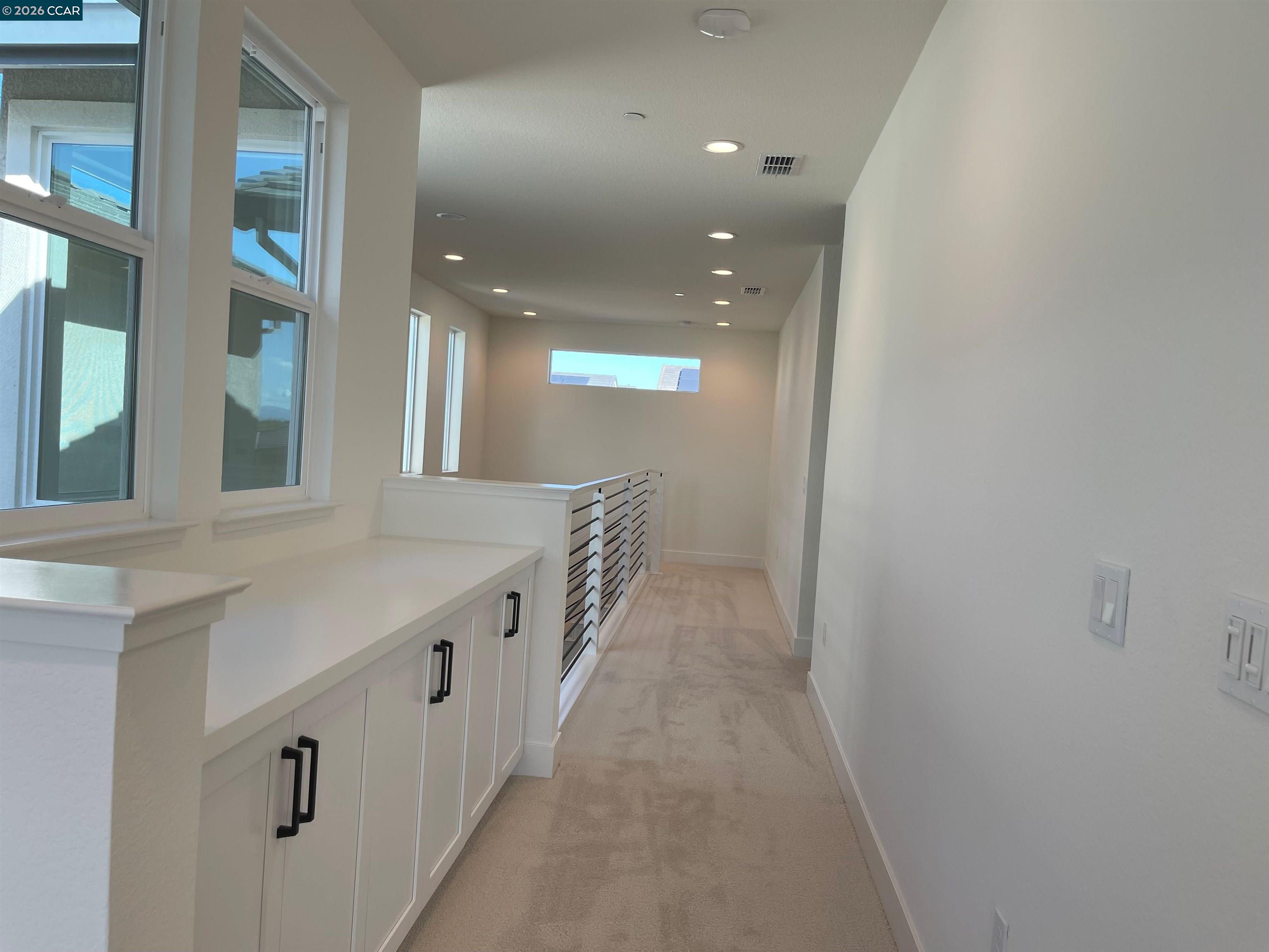 17549 Bushwick Lane Lathrop, CA 95330 - Photo 10 of 10 a view of a hallway with windows