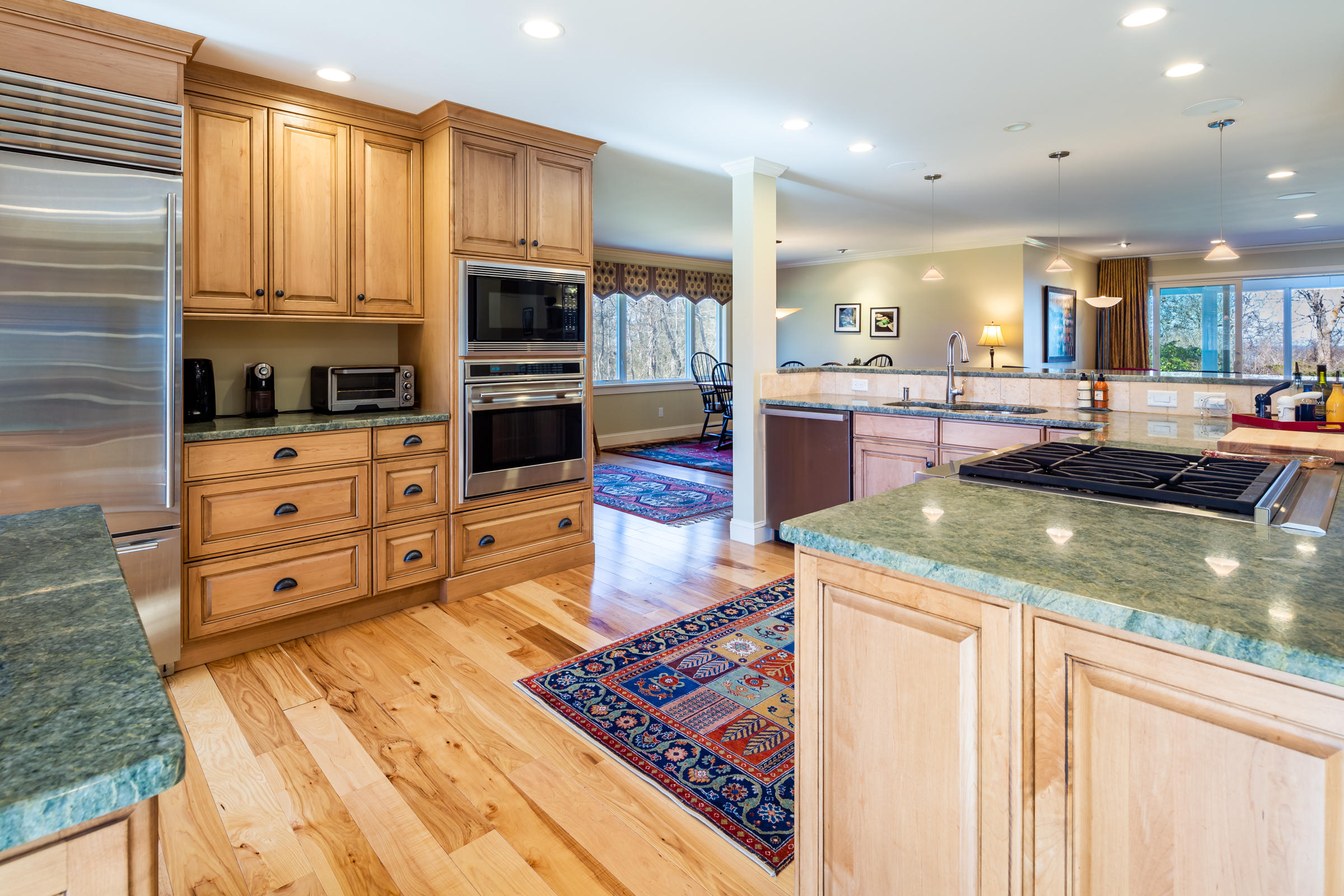 31 Wheeler Drive Brewster, MA 02631 - Photo 12 of 39 a kitchen with stainless steel appliances granite countertop a stove and a sink